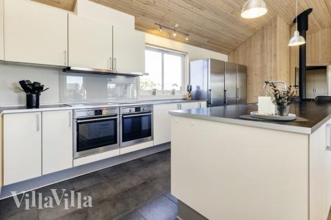 Köket i lyxstuga nr 267 är utrustat så att ni kan laga mat till 20 personer.