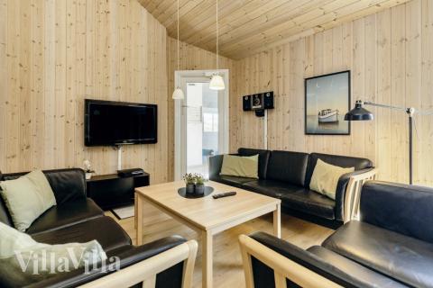 Soffhörnan i lyxstuga 267 i Nordjylland.