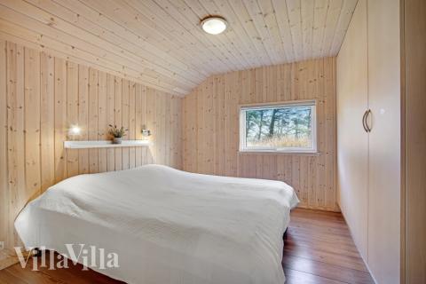 Ett av de 5 utmärkta sovrummen i lyxstuga nr 236 i Nordjylland.