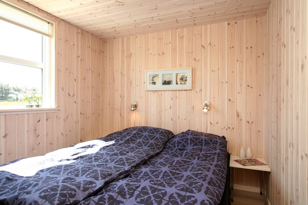 Ett av de 9 utmärkta sovrummen i lyxstuga nr 192 i Nordjylland.