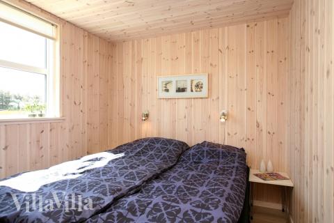 Ett av de 9 utmärkta sovrummen i lyxstuga nr 192 i Nordjylland.