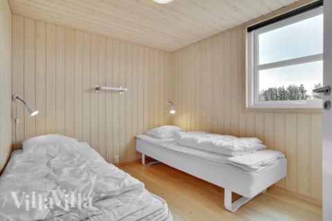Ett av de 8 utmärkta sovrummen i lyxstuga nr 194 i Nordjylland.