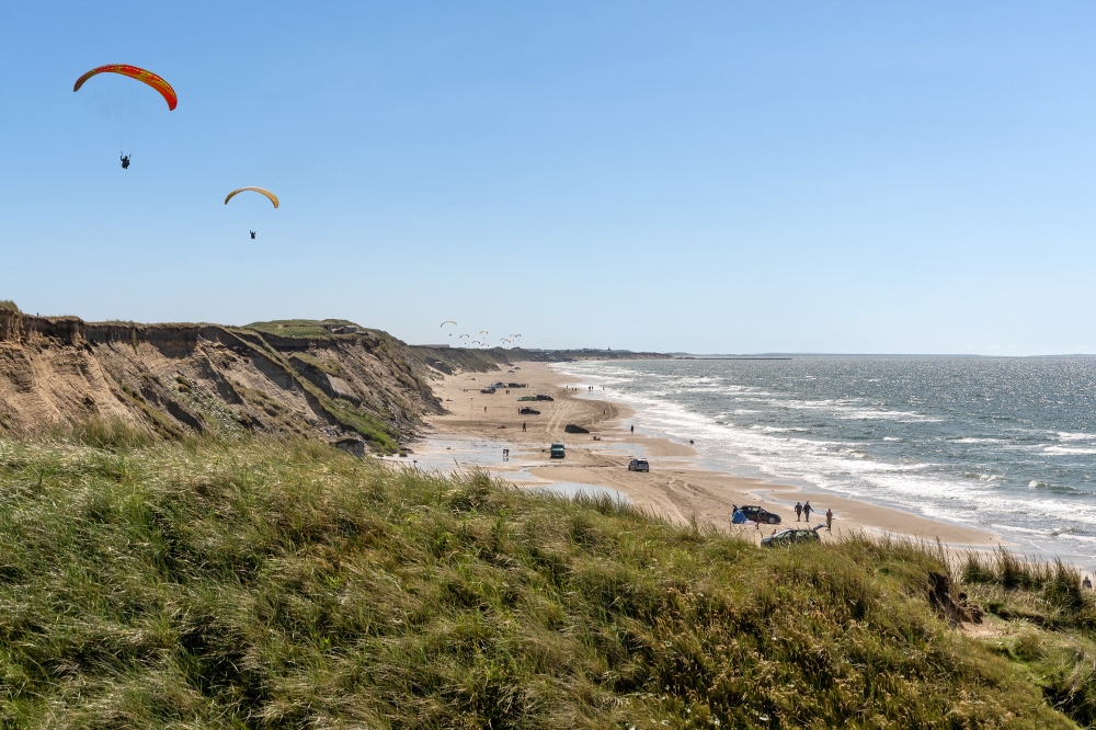 Stranden i närheten av lyxhus 195.