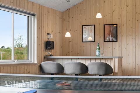 Aktivitetsrum i lyxstuga nr 304 med 7 sovrum och plats för 18 personer.