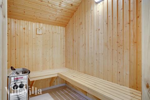 Njut av bastuvärmen i lyxstuga nr 264 för 14 personer