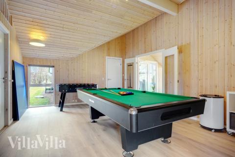 Aktivitetsrum i lyxstuga nr 264 med 5 sovrum och plats för 14 personer.