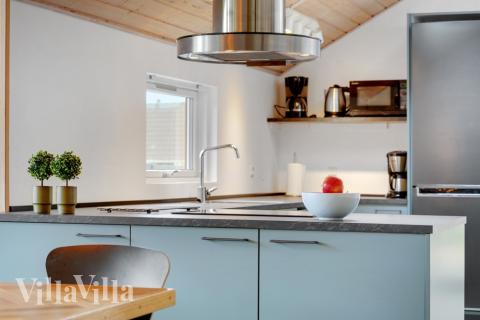 Köket i lyxstuga nr 264 är utrustat så att ni kan laga mat till 14 personer.