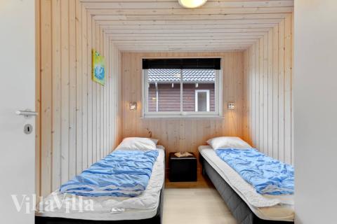 Ett av de 7 utmärkta sovrummen i lyxstuga nr 280 i Sydjylland.