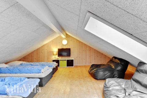 Några av de 18 sovplatserna finns på loftet i lyxstuga nr 280