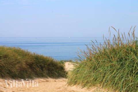 Stranden i närheten av lyxhus 293.