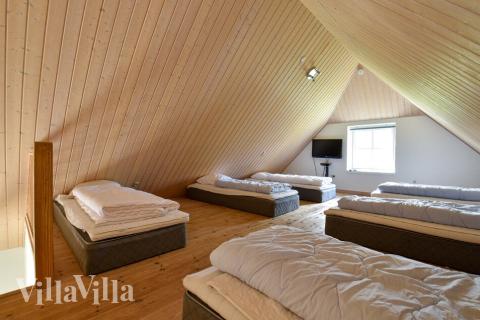 Några av de 24 sovplatserna finns på loftet i lyxstuga nr 146