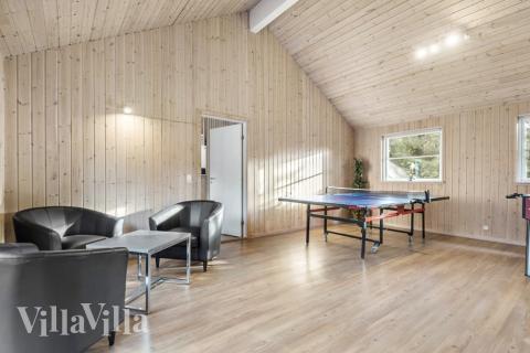 Aktivitetsrum i lyxstuga nr 197 med 9 sovrum och plats för 22 personer.