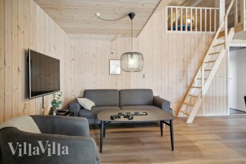 Tävla i sommarhusets aktivitetsrum när ni besöker lyxhus nr 176 i Vestjylland.