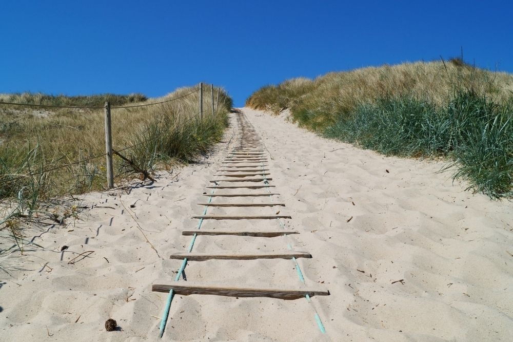 Stranden i närheten av lyxhus 294.