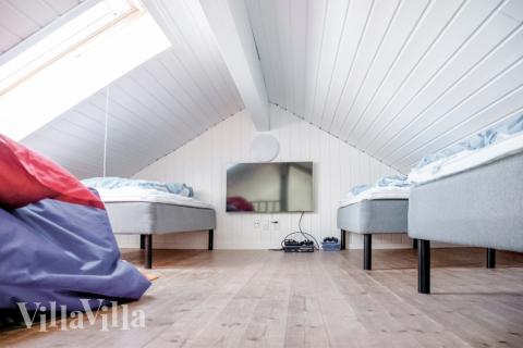 Några av de 24 sovplatserna finns på loftet i lyxstuga nr 201