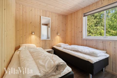 Ett av de 9 utmärkta sovrummen i lyxstuga nr 261 i Vestjylland.