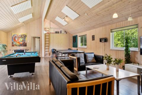 Tävla i sommarhusets aktivitetsrum när ni besöker lyxhus nr 261 i Vestjylland.