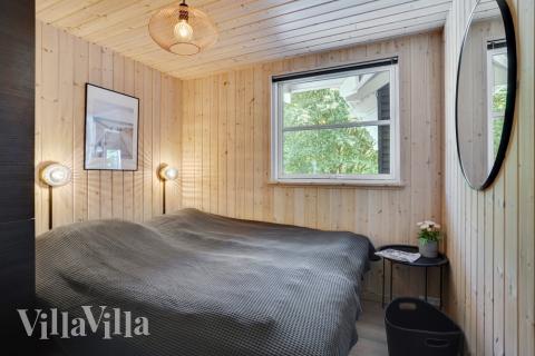 Ett av de 6 utmärkta sovrummen i lyxstuga nr 277 i Nordsjälland.