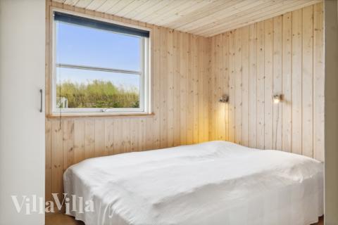 Ett av de 9 utmärkta sovrummen i lyxstuga nr 202 i Lolland/Falster/Møn.