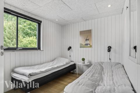 Ett av de 7 utmärkta sovrummen i lyxstuga nr 276 i Nordsjälland.