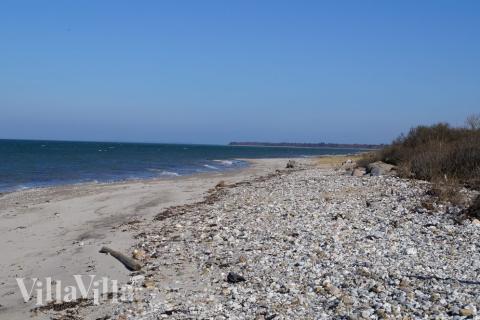Stranden i närheten av lyxhus 301.