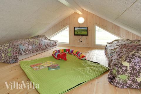 I sovalkoven är inrättat en barnhörna 