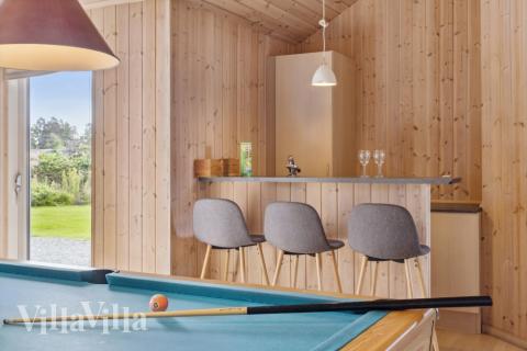 Sommarstuga 208 är utrustad med egen bar