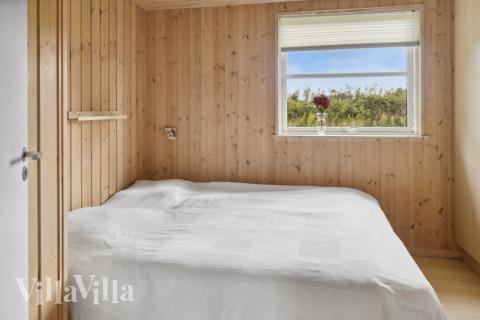 Ett av de 9 utmärkta sovrummen i lyxstuga nr 208 i Lolland/Falster/Møn.