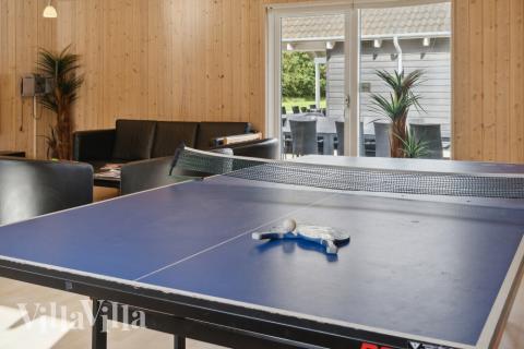 Aktivitetsrum i lyxstuga nr 208 med 9 sovrum och plats för 24 personer.