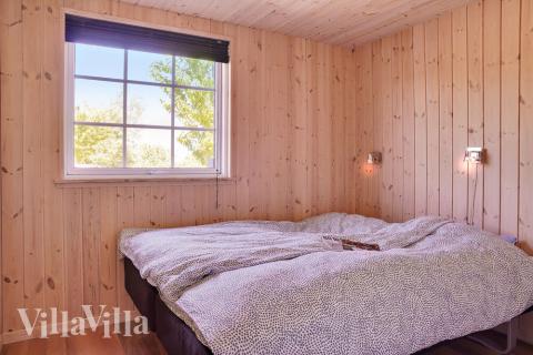 Ett av de 7 utmärkta sovrummen i lyxstuga nr 253 i Lolland/Falster/Møn.