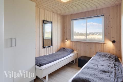 Ett av de 7 utmärkta sovrummen i lyxstuga nr 272 i Lolland/Falster/Møn.