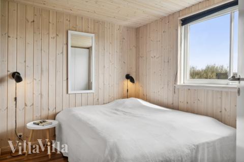 Ett av de 7 utmärkta sovrummen i lyxstuga nr 282 i Lolland/Falster/Møn.