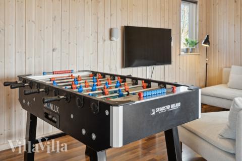 Aktivitetsrum i lyxstuga nr 282 med 7 sovrum och plats för 19 personer.