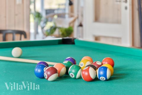 Tävla i sommarhusets aktivitetsrum när ni besöker lyxhus nr 282 i Lolland/Falster/Møn.