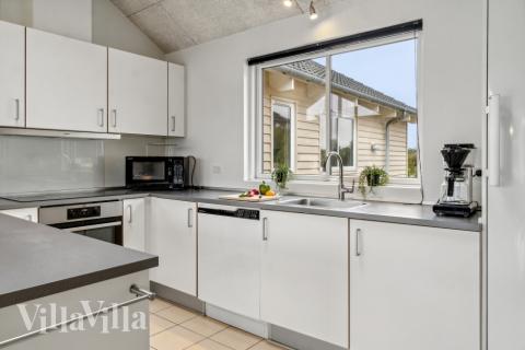 Köket i lyxstuga nr 306 är utrustat så att ni kan laga mat till 16 personer.