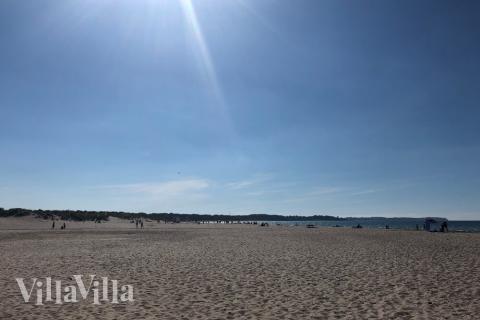 Stranden i närheten av lyxhus 309.