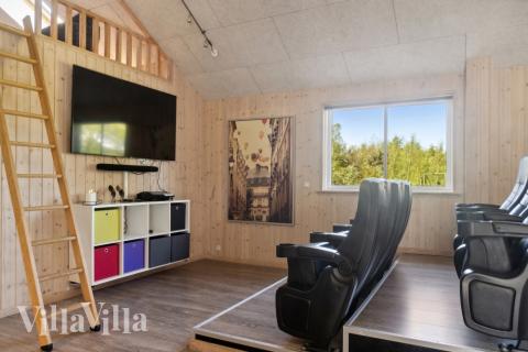 Tävla i sommarhusets aktivitetsrum när ni besöker lyxhus nr 314 i Lolland/Falster/Møn.