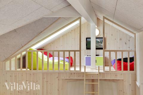 Några av de 22 sovplatserna finns på loftet i lyxstuga nr 318