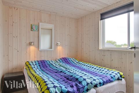 Ett av de 7 utmärkta sovrummen i lyxstuga nr 322 i Fyn och öar.