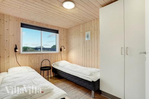 Ett av de 7 utmärkta sovrummen i lyxstuga nr 328 i Vestjylland.