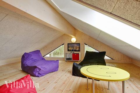 Några av de 24 sovplatserna finns på loftet i lyxstuga nr 330