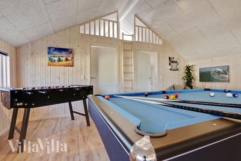 Aktivitetsrum i lyxstuga nr 336 med 5 sovrum och plats för 14 personer.