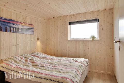 Ett av de 5 utmärkta sovrummen i lyxstuga nr 341 i Fyn och öar.