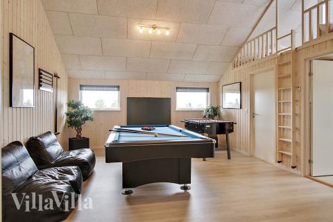 Aktivitetsrum i lyxstuga nr 341 med 5 sovrum och plats för 14 personer.