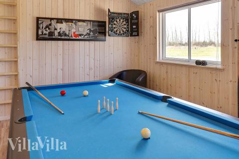 Aktivitetsrum i lyxstuga nr 343 med 8 sovrum och plats för 20 personer.