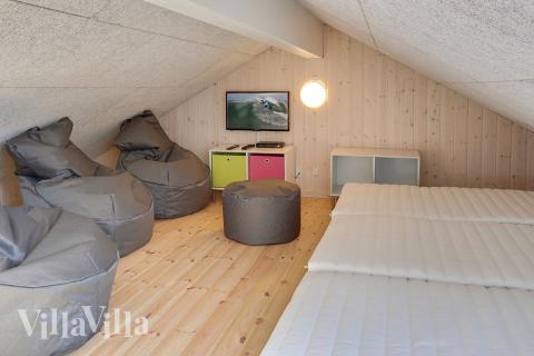 Några av de 16 sovplatserna finns på loftet i lyxstuga nr 344