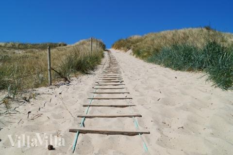 Stranden i närheten av lyxhus 348.