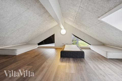 Några av de 22 sovplatserna finns på loftet i lyxstuga nr 351