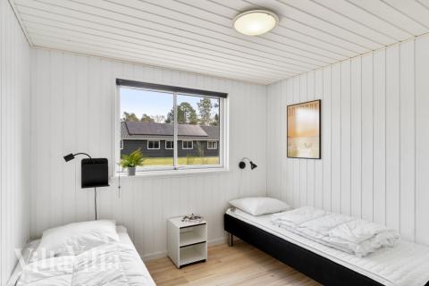 Ett av de 9 utmärkta sovrummen i lyxstuga nr 350 i Nordsjälland.