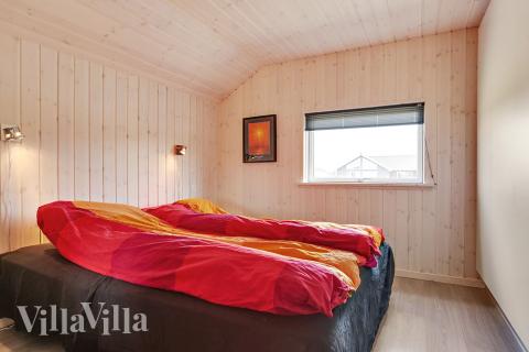 Ett av de 7 utmärkta sovrummen i lyxstuga nr 355 i Fyn och öar.